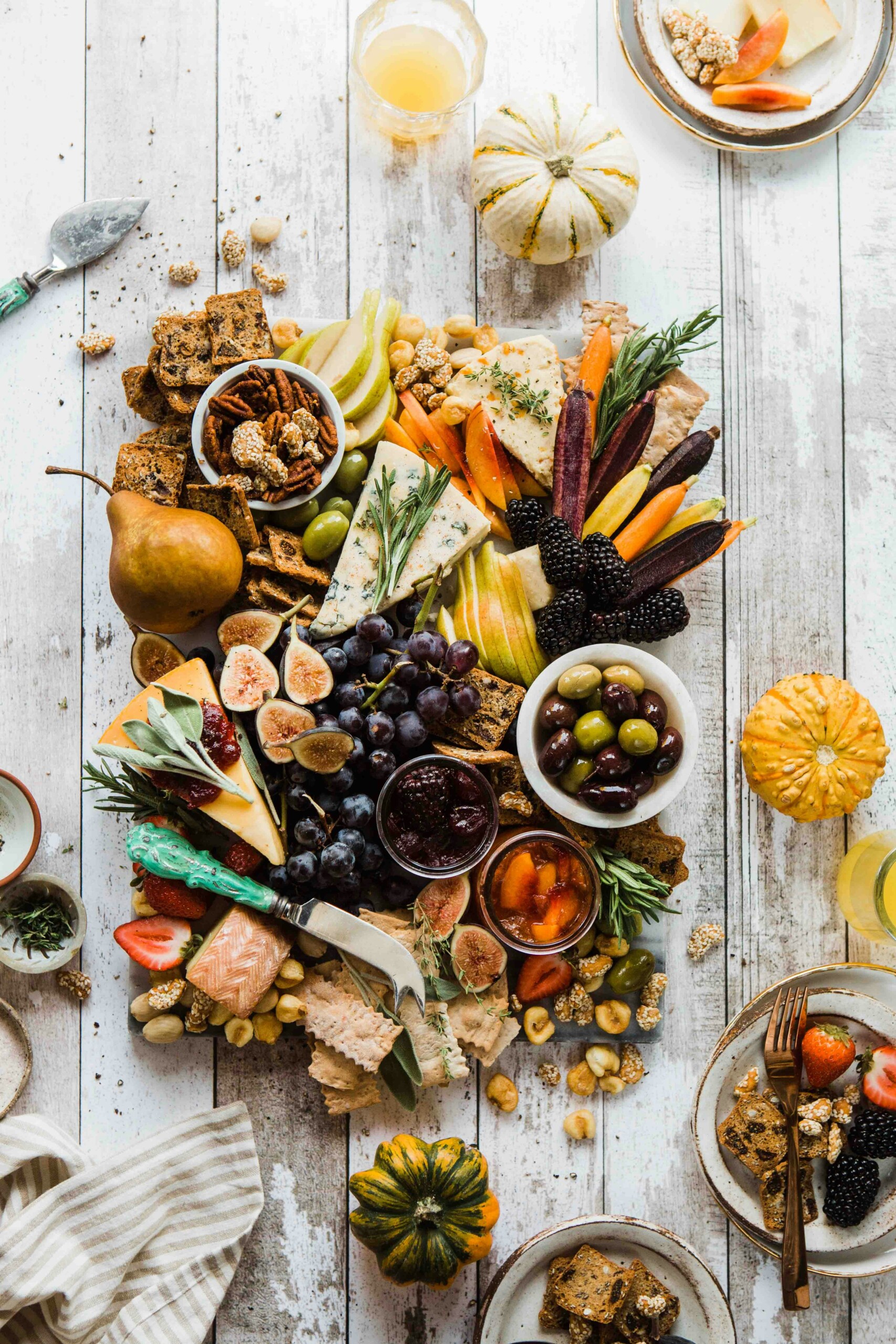 charcuterie board with fall pumpkin decor